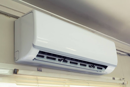 An indoor ductless mini-split unit on a wall.